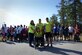 U.S. Air Force Senior Airman Michael Hall, 20th Aerospace Medicine Squadron flight and operation medical technician, center right, stands with his family and fellow runners before a 5K at Shaw Air Force Base, S.C., Feb. 25, 2017. The 20th Medical Group held the race to raise awareness for muscular dystrophy and to help Hall reach his goal of $10,000 in donations for the Muscular Dystrophy Association. (U.S. Air Force photo by Airman 1st Class Kelsey Tucker)