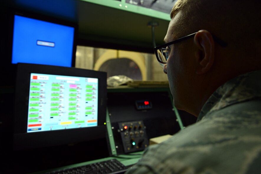 U.S. Air Force Staff Sgt. Dale Rodgers, 20th Component Maintenance Squadron aerospace propulsion craftsman, views a computer screen at a test cell facility at Shaw Air Force Base, S.C., March 3, 2017. The screen displays an F-16CM Fighting Falcon engine’s limits to Airmen running the engine, blinking when limits are reached. (U.S. Air Force photo by Airman 1st Class Kathryn R.C. Reaves)