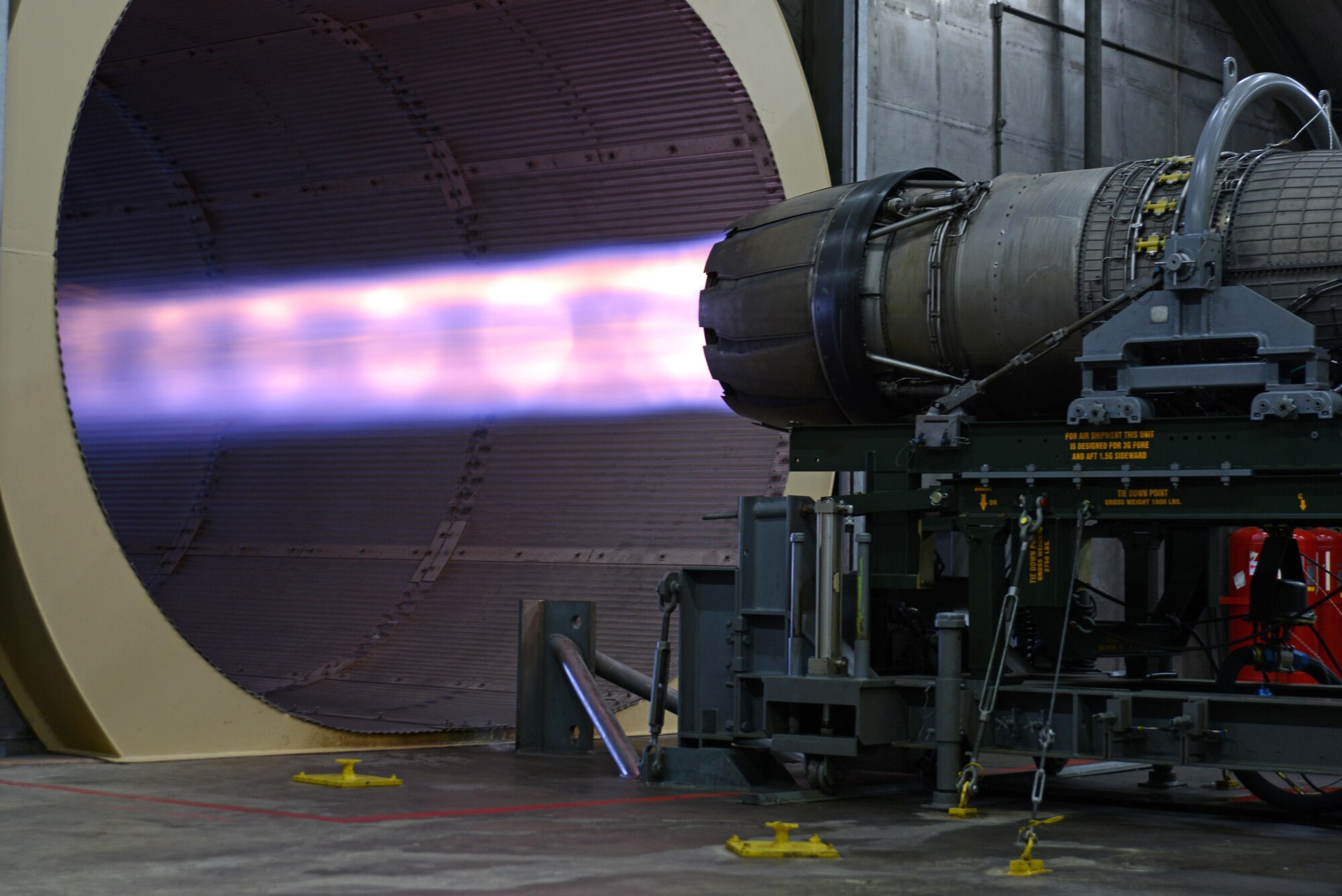 An F-16CM Fighting Falcon engine runs at a test cell facility at Shaw Air Force Base, S.C., March 3, 2017. At about 15 feet in length, the F110-GE-129 turbofan engine produces approximately 29,000 pounds of thrust. (U.S. Air Force photo by Airman 1st Class Kathryn R.C. Reaves)