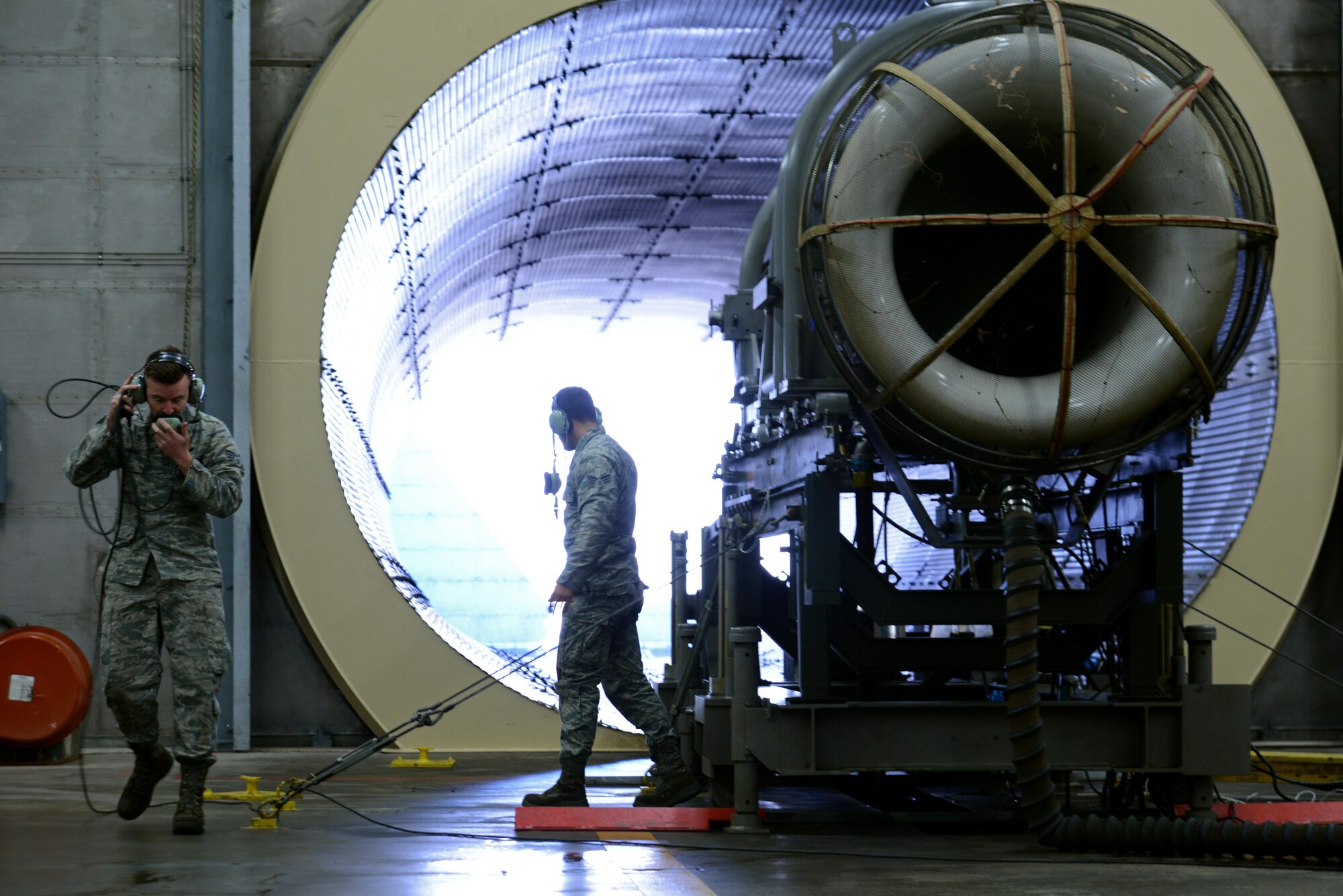 U.S. Air Force Senior Airmen Jarrod Adams, left, and Dakota Chavis, right, 20th Component Maintenance Squadron aerospace propulsion journeymen, perform an engine check at a test cell facility at Shaw Air Force Base, S.C., March 3, 2017. After running an F-16CM Fighting Falcon engine, an inspection is performed to check for leaks and damage. (U.S. Air Force photo by Airman 1st Class Kathryn R.C. Reaves)