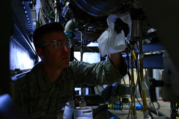 U.S. Air Force Senior Airman Jarrod Adams, 20th Component Maintenance Squadron aerospace propulsion journeyman, checks a magnetic chip detector (MCD) at a test cell facility at Shaw Air Force Base, S.C., March 3, 2017. While an F-16CM Fighting Falcon engine is tested, the MCD attracts metal shavings from bearings in the engine. Because each bearing is made of a different type of metal, nondestructive inspection Airmen can pinpoint which bearing is failing and needs replacement. (U.S. Air Force photo by Airman 1st Class Kathryn R.C. Reaves)