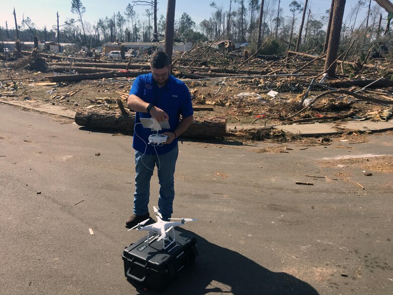 A member of the USACE, Jacksonville District (Jacksonville), Unmanned Aircraft System (UAS) team prepares for flight Feb. 24 during recovery operations near Albany, Ga. Two members of the UAS team integrated with a USACE, Mobile District, emergency response team to provide aerial reconnaissance of debris in the area. 