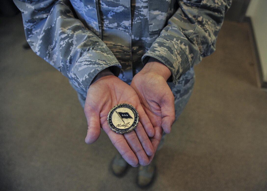 Lt. Gen. Mark Ediger, Surgeon General of the Air Force, presented Kirtland medics with the honorary three-star coin during his visit to Kirtland Air Force Base, New Mexico, March 2. Personnel receiving the coin were recognized by their commanders for being outstanding professionals in their career fields. 
