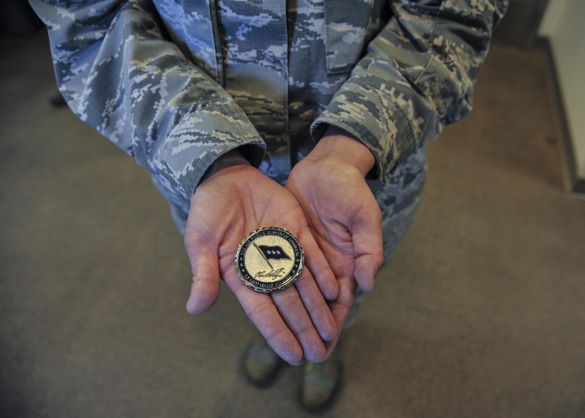 Lt. Gen. Mark Ediger, Surgeon General of the Air Force, presented Kirtland medics with the honorary three-star coin during his visit to Kirtland Air Force Base, New Mexico, March 2. Personnel receiving the coin were recognized by their commanders for being outstanding professionals in their career fields. 
