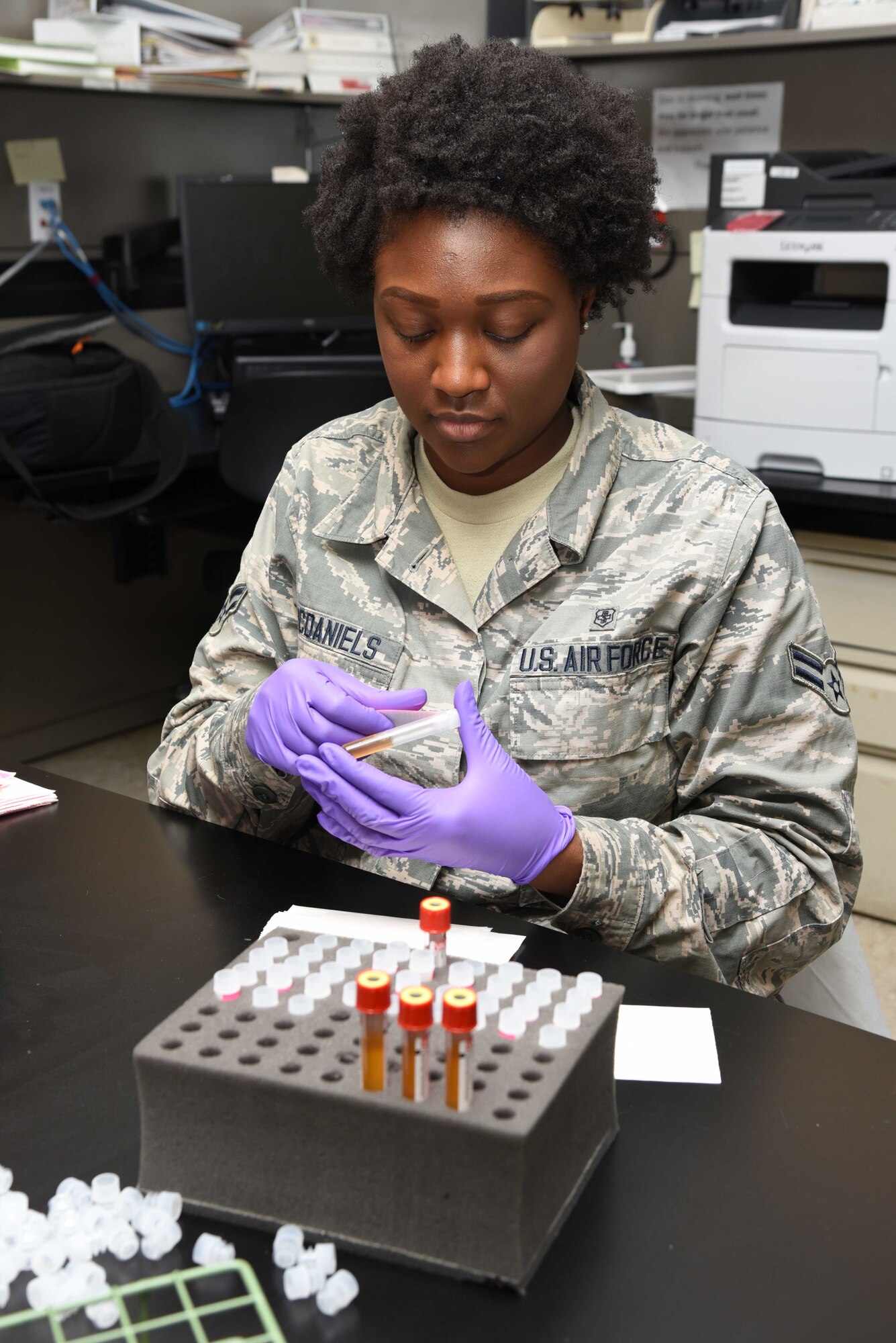 Airman 1st Class Danielle McDaniels, 403rd Aeromedical Staging Squadron aerospace medical technician, processes patient specimens for analysis Feb. 10 at Keesler Air Force Base, Mississippi. One of the roles of ASTS is to make sure that the wing’s Citizen Airmen are healthy and fit for service worldwide. (U.S. Air Force photo/Tech. Sgt. Ryan Labadens)