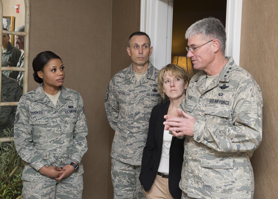 Lt. Gen. Sam Cox, 18th Air Force commander, his wife, Tammy Cox, and Chief Master Sgt. Todd Petzel, 18th AF command chief, tour the Fisher House for Families of the Fallen March 2, 2017, at Dover Air Force Base, Delaware. The Fisher House provides care, service and support to families of fallen Soldiers, Marines, Sailors and Airmen who attend Dignified Transfers. It is the only one of its kind designed for families of the fallen and is also managed by uniformed personnel. (U.S. Air Force photo by Senior Airman Zachary Cacicia)