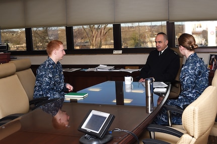 U.S. Strategic Command (USSTRATCOM) Deputy Commander, U.S. Navy Vice Adm. Charles A. “ Chas” Richard meets with the USSTRATCOM “Bull Ensign,” U.S. Navy Ensign Ryan A. Kaufman (left), and the USSTRATCOM “George Ensign,” U.S. Navy Ensign Allison Welling (right) for junior officer-requested guidance, March 7, 2017, at USSTRATCOM headquarters, Offutt Air Force Base, Neb. In U.S. naval history, the “Bull Ensign” is the senior ensign of a command and the “George Ensign” is the officer with the least seniority in the wardroom of a command.  One of nine Department of Defense unified combatant commands, USSTRATCOM has global strategic missions assigned through the Unified Command Plan that include strategic deterrence; space operations; cyberspace operations; joint electronic warfare; global strike; missile defense; intelligence, surveillance and reconnaissance; and analysis and targeting. 