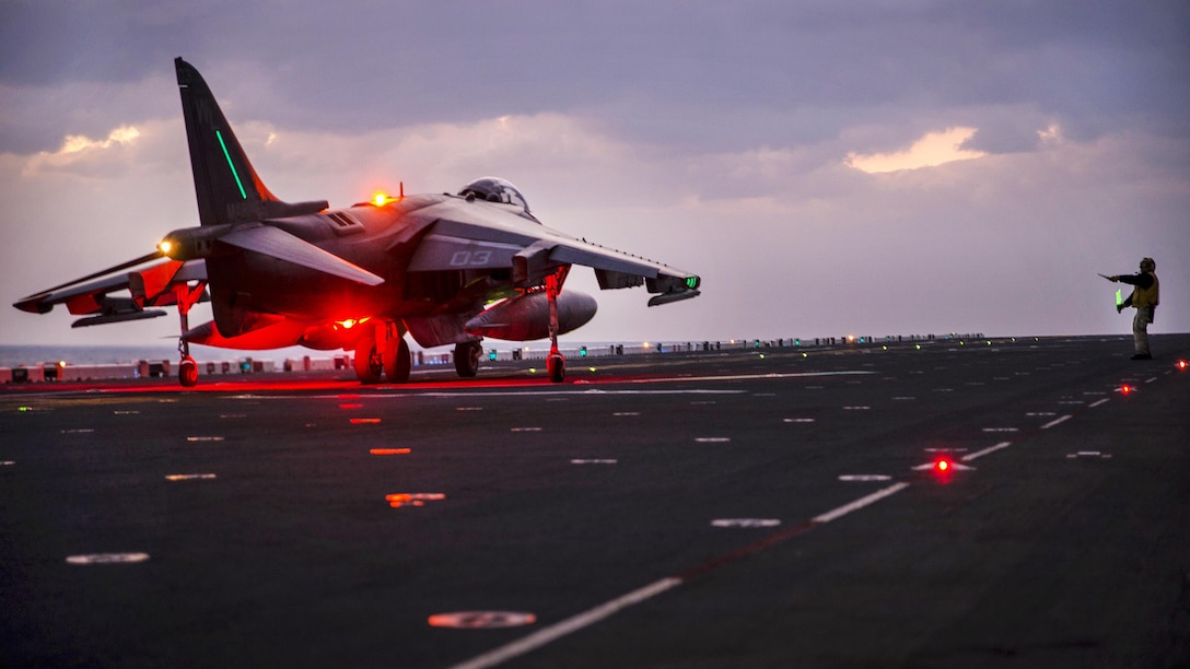 A Marine Corps AV-8B Harrier II takes off from the flight deck of the amphibious assault ship USS Bonhomme Richard during night operations in the Philippine Sea, March 2, 2017. The pilot is assigned to Marine Attack Squadron 311. The Bonhomme Richard is on a routine patrol, operating in the Indo-Asia-Pacific region to serve as a forward capability for any type of contingency. Navy photo by Petty Officer 2nd Class Diana Quinlan