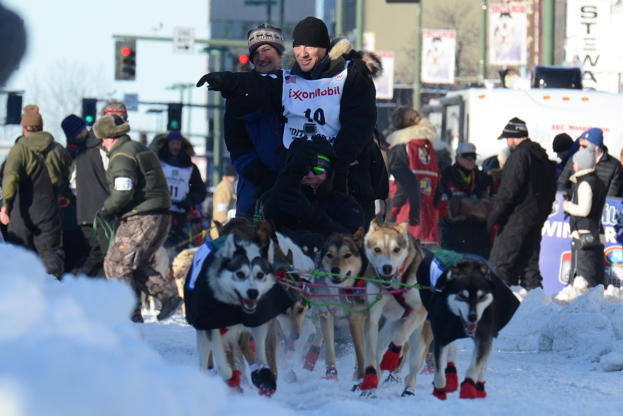 Air Force Lt. Col. Roger Lee participates in the ceremonial start to the 45th annual Iditarod Trail Sled Dog Race, in Anchorage, Alaska, March 4, 2017. More than 1,150 dogs pulled 72 mushers for the day’s 11-mile run to Campbell Airstrip. 