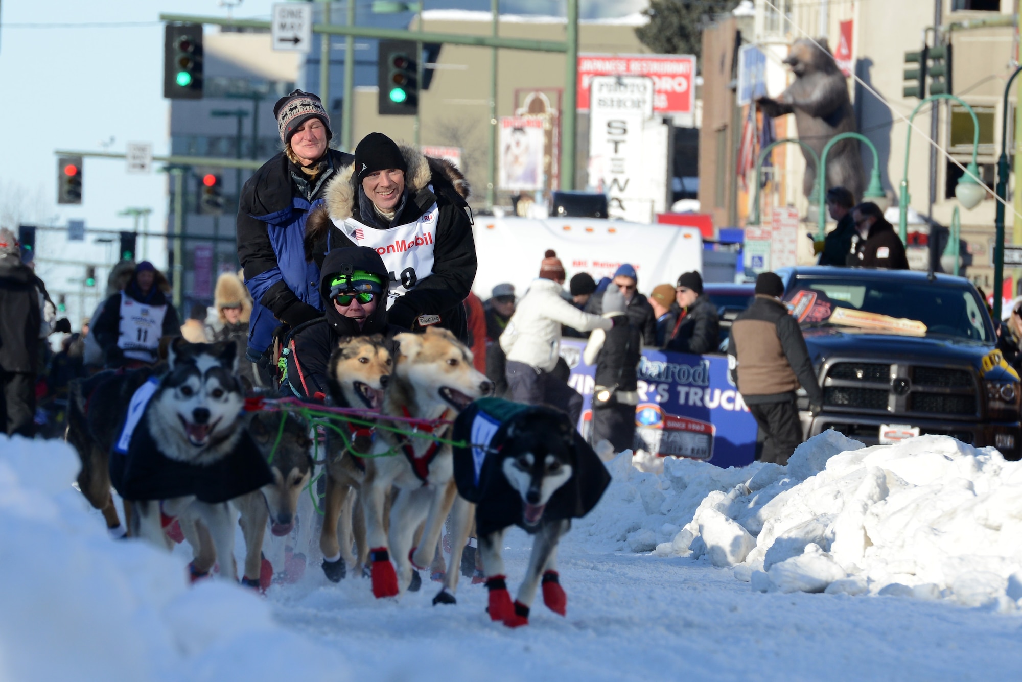 Air Force Lt. Col. Roger Lee participates in the ceremonial start to the 45th annual Iditarod Trail Sled Dog Race, in Anchorage, Alaska, March 4, 2017. More than 1,150 dogs pulled 72 mushers for the day’s 11-mile run to Campbell Airstrip. 