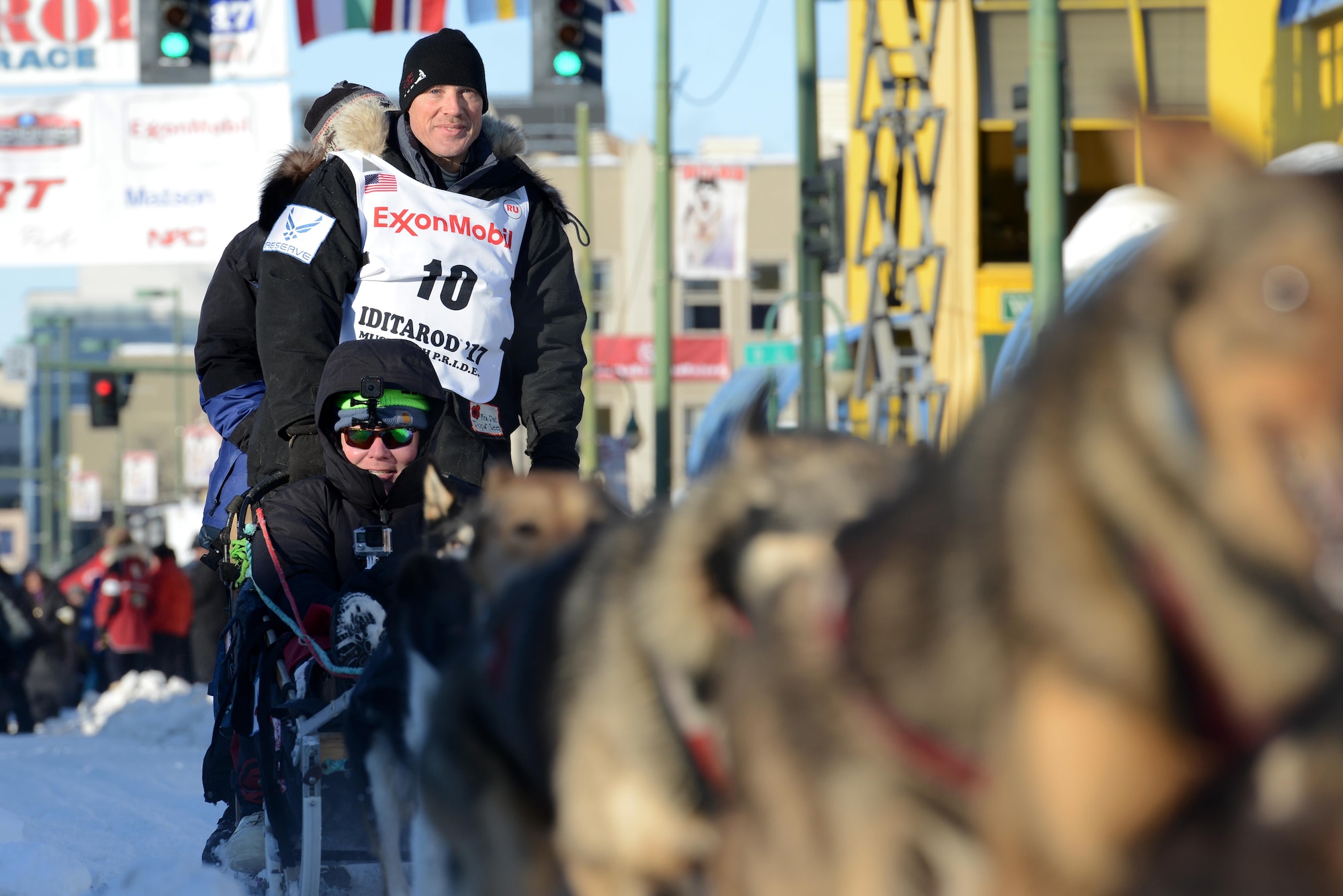 Air Force Lt. Col. Roger Lee participates in the ceremonial start to the 45th annual Iditarod Trail Sled Dog Race, in Anchorage, Alaska, March 4, 2017. More than 1,150 dogs pulled 72 mushers for the day’s 11-mile run to Campbell Airstrip. 