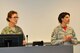 Senior Master Sgt. Anne Williams, 114th Munitions production superintendent, and Master Sgt. Casey Bullies, 114th Operations Group administrative assistant, speak during the inaugural Top 3 meeting at Joe Foss Field, S.D., March 5, 2017. Sgt. Williams and Sgt. Bullis were instrumental in getting the Top 3 going at the 114th Fighter Wing. (U.S. Air National Guard photo by Master Sgt. Christopher Stewart/Released)