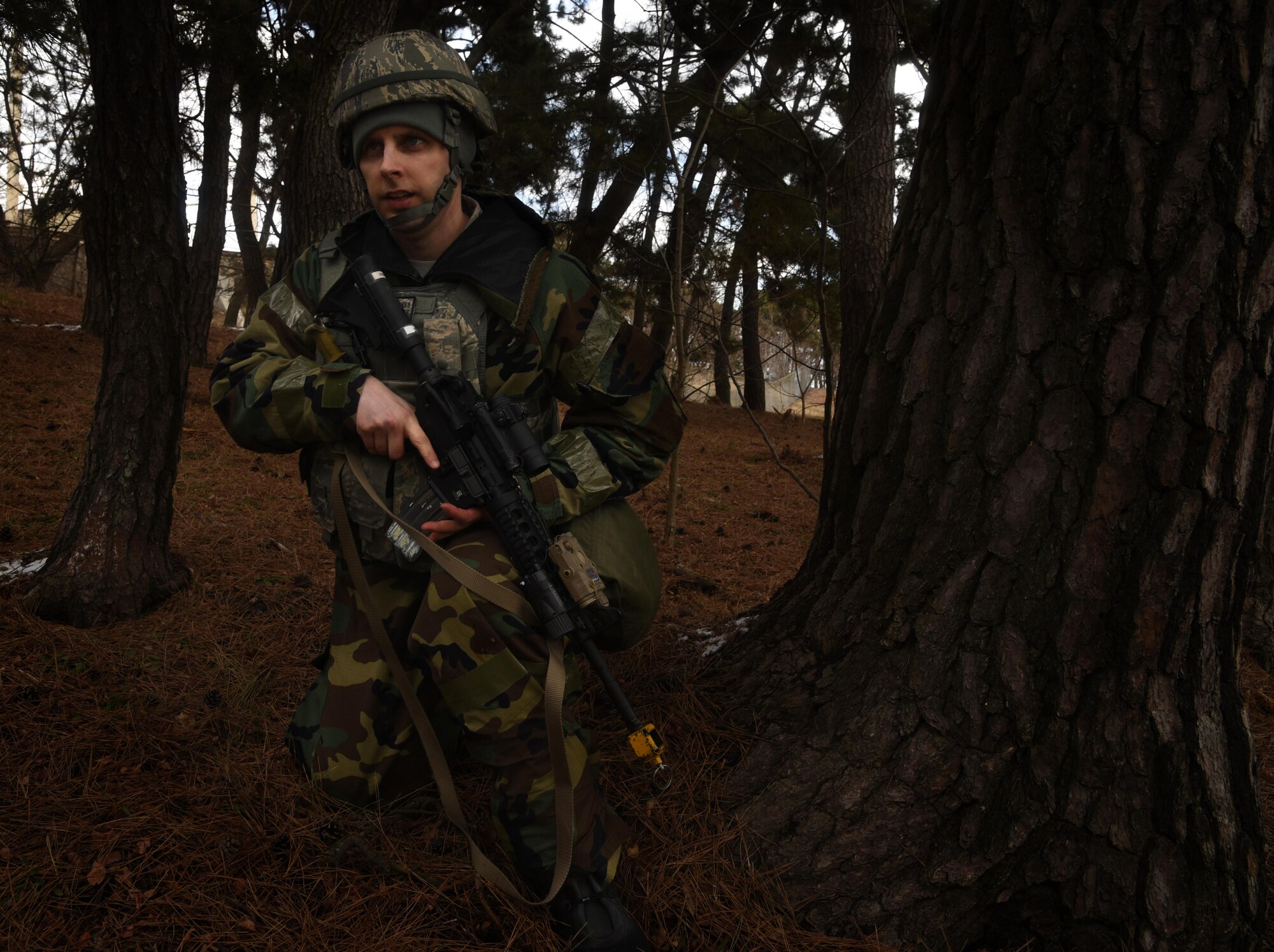 Master Sgt. Brian Stokes, 8th Security Forces Squadron team member, secures the perimeter during an opposition forces training scenario at Kunsan Air Base, Republic of Korea, March 7, 2017. Stokes executed this procedure as part of exercise Beverly Pack 17-2, a no-notice training exercise used to increase U.S. combat readiness and ultimately enhance the U.S. commitment to maintaining peace in the region. (U.S. Air Force photo by Tech. Sgt. Jeff Andrejcik/Released)