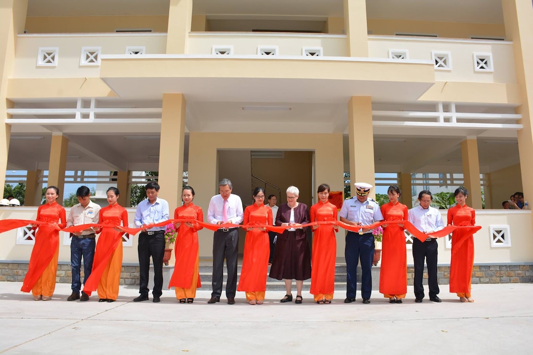 On March 1, Susan Sutton (sixth from right), deputy chief of mission at the U.S. Embassy in Hanoi, presented the Ninh Thuan Province disaster management coordination center to the people of Vietnam during a ceremony. The Alaska District managed the construction of the two-story facility, which is one of 11 similar projects completed along Vietnam’s coastal provinces that are hit by cyclone and flooding events. In addition to the building, a communications system will also support efforts to prevent and minimize loss of life and property during emergencies. The total cost of the building is about $693,400 and required 11 months to complete.
