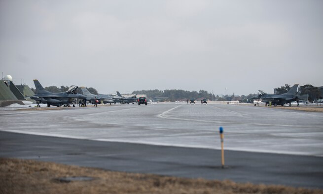 U.S. Air Force F-16 Fighting Falcons on the flightline at Misawa Air Base, Japan, March 4, 2017. The 14th Fighter Squadron returned from COPE NORTH 17 which is a long-standing exercise, originating here in 1978, designed to enhance multilateral air operations between the U.S. Air Force, U.S. Navy, Japan Air Self-Defense Force and Royal Australian Air Force. (U.S. Air Force photo by Senior Airman Brittany A. Chase)
