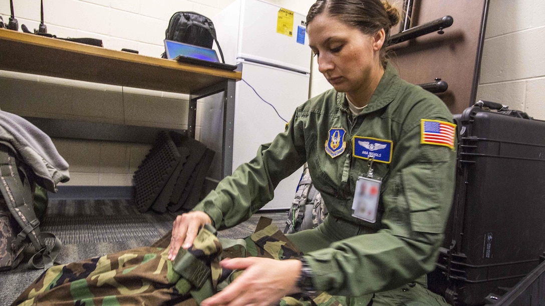 Air Force Staff Sgt. Ana Nichols packs a chemical, biological, radiological and nuclear bag at the Combat Readiness Training Center at Gulfport, Miss., March 5, 2017. Nichols is assigned to the 514th Aeromedical Evacuation Squadron, Air Mobility Command. Air Force photo by Master Sgt. Mark C. Olsen