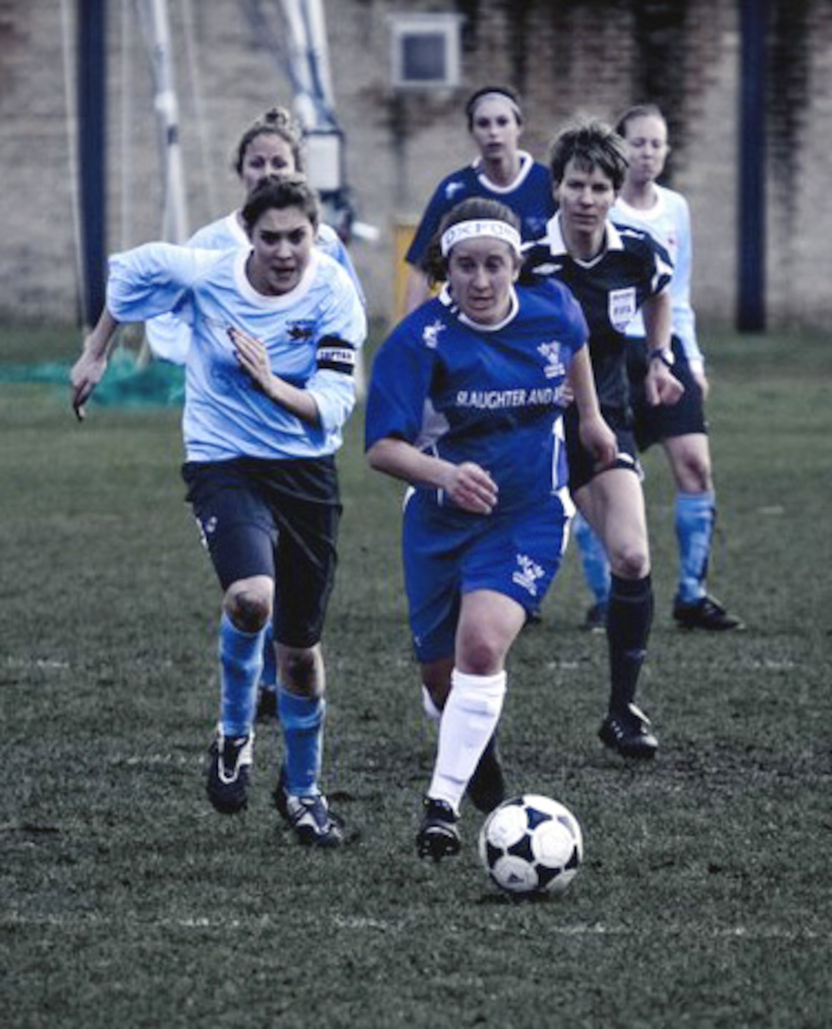 Then-Lt. Roni Yadlin, right, a 2009 graduate of the U.S. Air Force Academy, played for University of Oxford during the school's 2010 season. Seen here, the 2009 Holaday Scholar dribbles the ball upfield in a game against Cambridge in February, 2010. (U.S. Air Force photo).