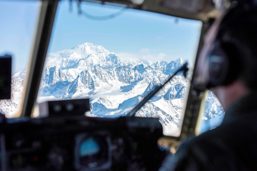 An Alaska Air National Guard crew flies a C-130 Hercules aircraft near Denali, the highest point in North America, March 4, 2017. Air National Guard photo by Staff Sgt. Edward Eagerton