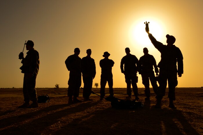 Support, safety and rigging personnel prepare for a static line jump and airdrop in N'Djamena, Chad, March 4, 2017 as part of Flintlock 17.  Flintlock is an annual special operations exercise involving more than 20 nations that strengthens security institutions, promotes multinational sharing of information, and develops interoperability among partner nation in North and West Africa. Army photo by Richard Bumgardner