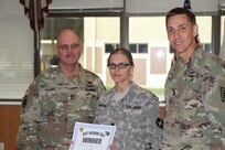 3rd Medical Command Deployment Support Command Team, Major General William Shane Lee and Command Sergeant Major Robert Boudnik, recognize Specialist Katie Nadeau from the 804th Medical Brigade as the 2017 3rd Medical Command's Enlisted Best Warrior.