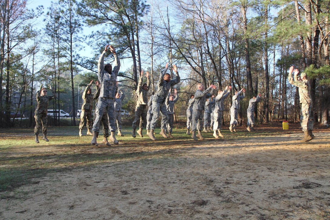 Command Sergeant Major of the 3rd Medical Command Deployment Support in Forest Park, Georgia, Robert Boudnik, conducts conditioning drills with soldiers from the 3rd Medical Command and Army Reserve Medical Command at the 2017 Joint Division Best Warrior Competition in Fort Benning, Georgia following the obstacle course on the final day of competition.