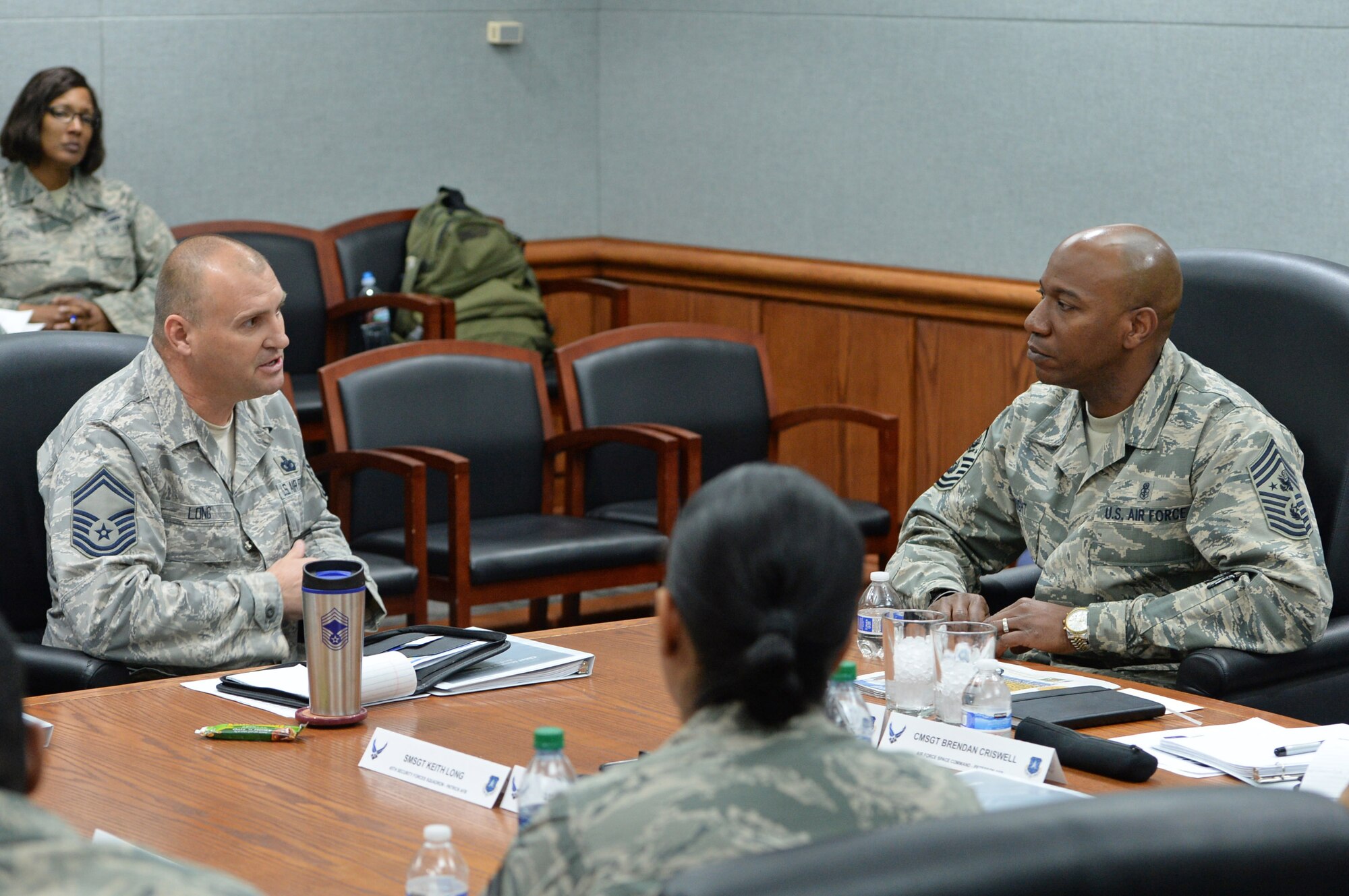 Chief Master Sgt. of the Air Force Kaleth O. Wright takes a question from Senior Master Sgt. Keith Long at Peterson Air Force Base, Colo., on Feb. 23, 2017. Wright held a roundtable discussion with senior mastersergeants who have been selected for promotion to chief mastersergeant at the Air Force Space Command Chief Master Sergeants and Spouses Orientation. Long is assigned to the 45th Security Forces Squadron at Patrick Air Force Base, Florida.  (U.S Air Force photo by Dave Grim)