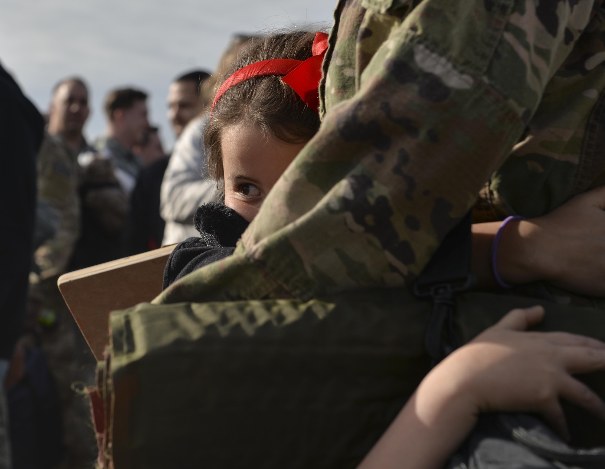 An Airman with the 621st Contingency Response Wing is welcomed home by his family at Travis Air Force Base, Calif., upon completing a four-month deployment in support of Operation Inherent Resolve, March 7, 2017. The 621st CRW—America’s only CRW—is a unique, bi-coastal unit whose forces are primarily stationed at both Travis AFB and Joint Base McGuire-Dix-Lakehurst, N.J. The 621st CRW consists of approximately 1,500 Airmen assigned to three groups, 11 squadrons and more than 20 geographically-separated operating locations aligned with major Army and Marine Corps combat units. (U.S. Air Force photo by Master Sgt. Joseph Swafford)
