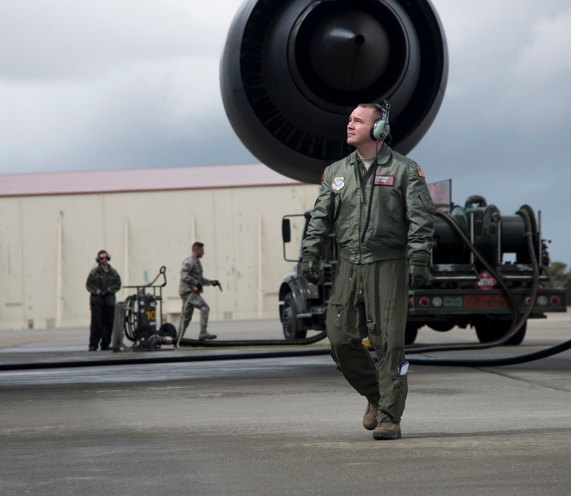 Tech Sgt. Timothy McCarthy, 22nd AS, walks around a C-5M Super Galaxy March 4, 2017, during a pre-flight inspection. As a flight engineer, it is McCarthy's job is to do pre-flight inspections of the aircraft prior to the pilots coming on board the aircraft to make sure everything is safe for the flight. (U.S. Air Force photo/Staff Sgt. Nicole Leidholm)