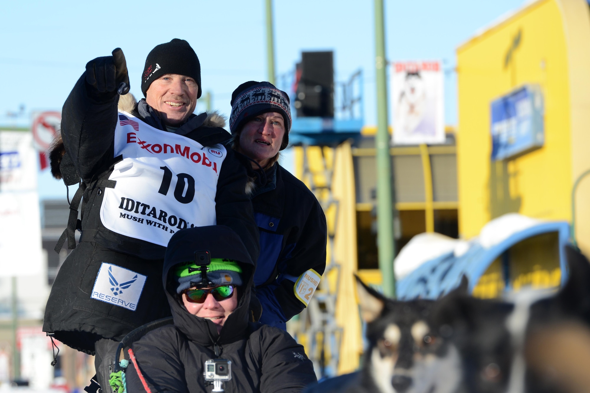 Air Force Lt. Col. Roger Lee participates in the ceremonial start to the 45th annual Iditarod Trail Sled Dog Race, in Anchorage, Alaska, March 4, 2017. More than 1,150 dogs pulled 72 mushers for the day’s 11-mile run to Campbell Airstrip. 