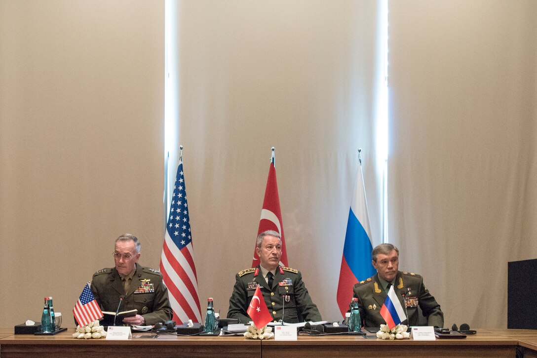 Marine Corps Gen. Joe Dunford, left, chairman of the Joint Chiefs of Staff, sits in a meeting with Gen. Hulusi Akar of the Turkish army, center, and Gen. Valery Gerasimov of the Russian army in Antalya, Turkey, March 6, 2017. DoD photo by Navy Petty Officer 2nd Class Dominique A. Pineiro