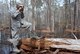 Airman 1st Class Tyzhe Speights, 51st Combat Communications Squadron, uses a lensatic compass to locate his teams designated point during a land navigation exercise with the 5th Combat Communications Group at Robins Air Force Base, Ga., March 2, 2017. The 5th CCG provides a two-week course for a maximum of 34 students and covers a variety of topics such as land navigation, improvised explosive device detection and much more. (U.S. Air Force photo by Tech. Sgt. Kelly Goonan/released)