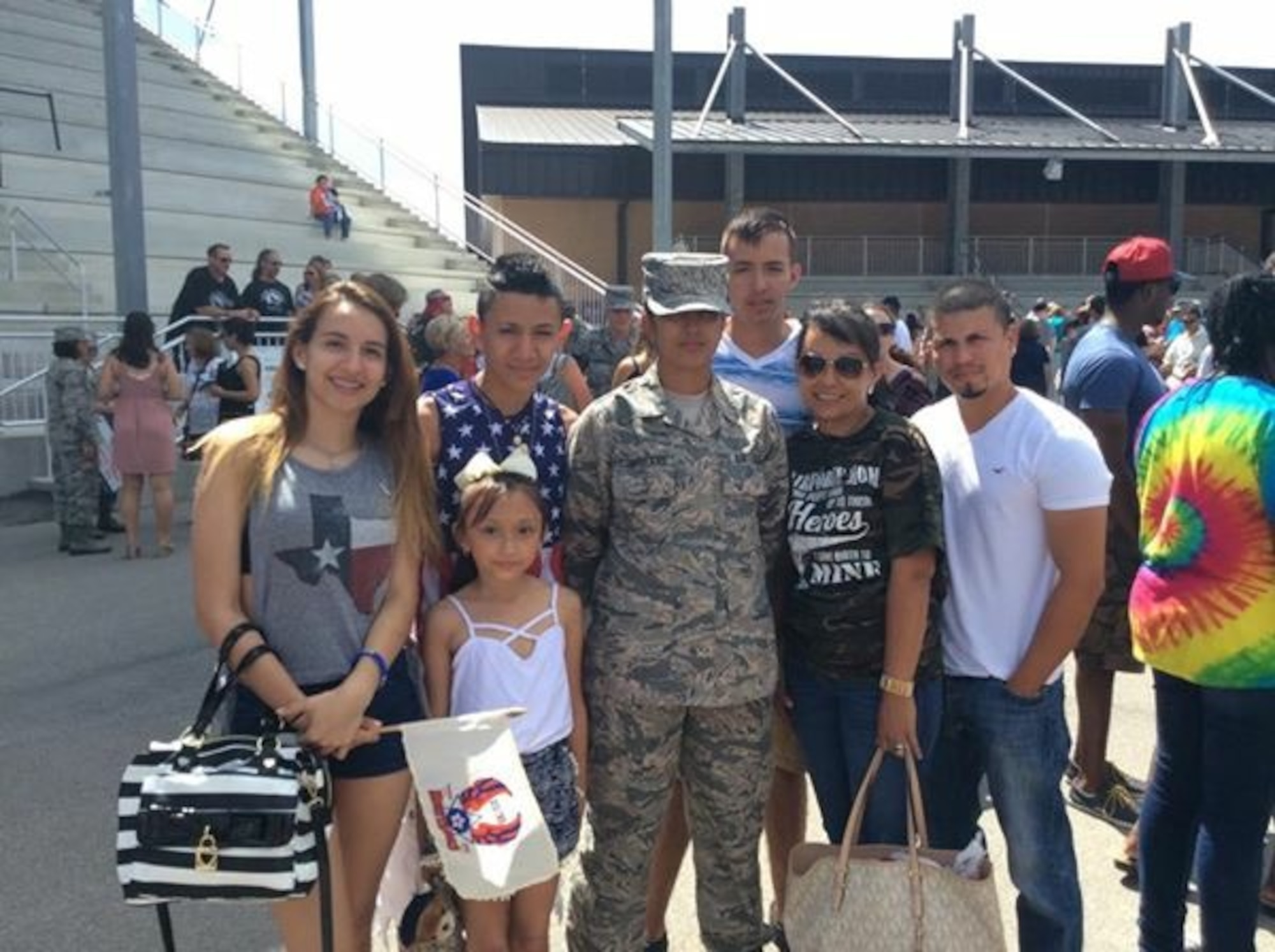 U.S. Air Force Airman 1st Class Alicia “Alice” Contreras, 7th Bomb Wing paralegal, with her family upon her basic military training graduation July 19, 2015, at Lackland Air Force Base, Texas. Contreras joined the U.S. Air Force with the promise that she would be able to gain U.S. citizenship. After being assigned to Dyess Air Force Base Oct. 15, 2015, she was able to start the process and finally took the oath of citizenship Feb. 7, 2017. (Courtesy photo)