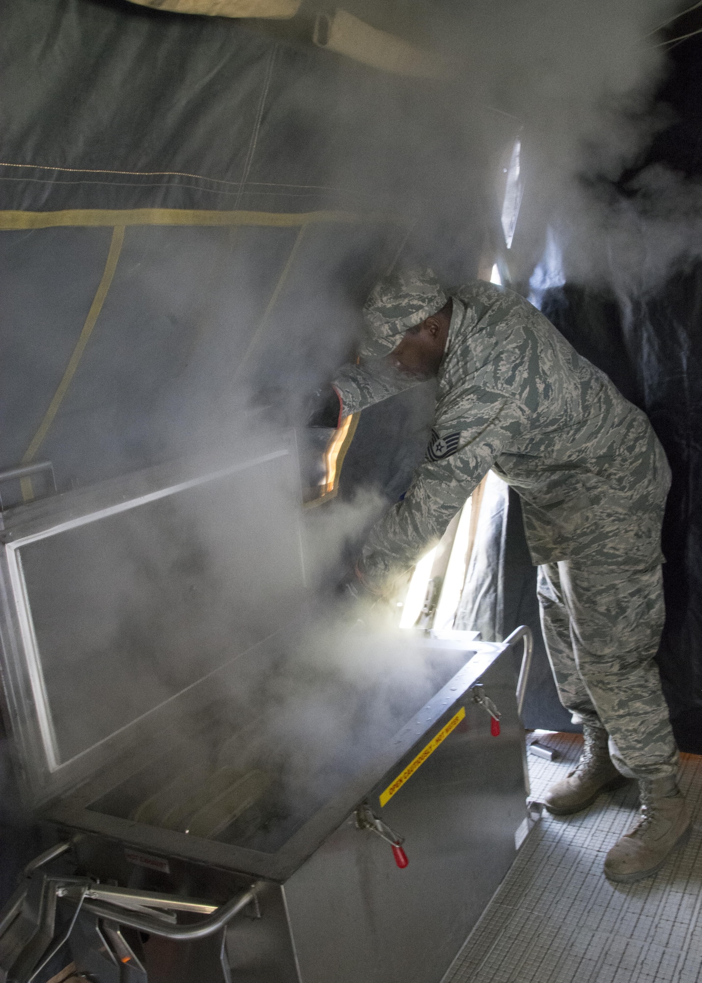 Food service Airmen with the 512th Memorial Affairs Squadron compete for the 2017 John L. Hennessy Award at Dover Air Force Base, Del., March 3, 2017. The Hennessy Award recognizes excellence in foodservices across multiple military branches. (U.S. Air Force photo / Renee M. Jackson)