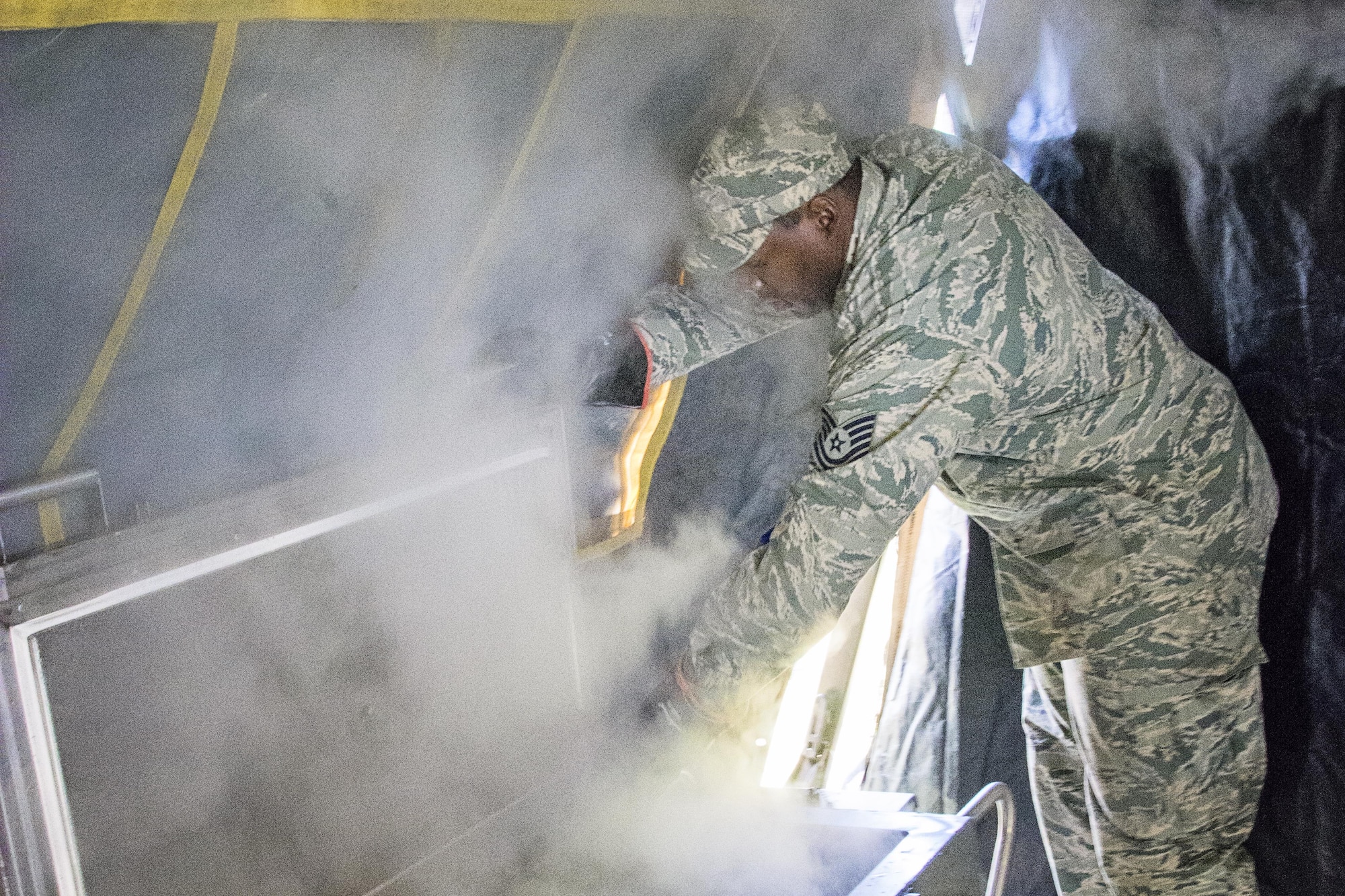 Food service Airmen with the 512th Memorial Affairs Squadron compete for the 2017 John L. Hennessy Award at Dover Air Force Base, Del., March 3, 2017. The Hennessy Award recognizes excellence in foodservices across multiple military branches. (U.S. Air Force photo / Renee M. Jackson)