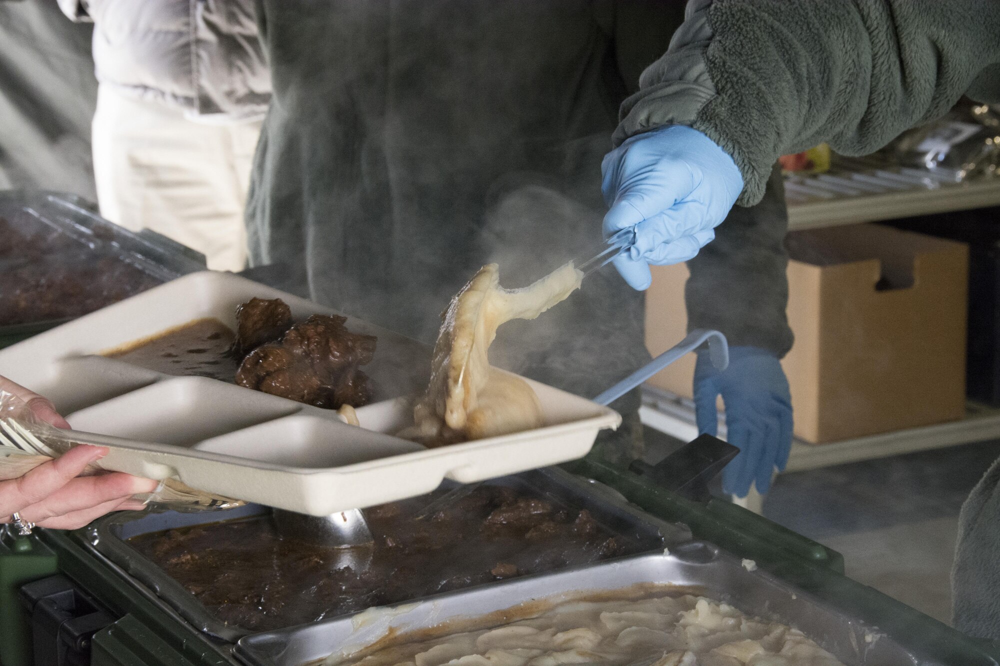 Food service Airmen with the 512th Memorial Affairs Squadron compete for the 2017 John L. Hennessy Award at Dover Air Force Base, Del., March 3, 2017. The Hennessy Award recognizes excellence in foodservices across multiple military branches. (U.S. Air Force photo / Renee M. Jackson)