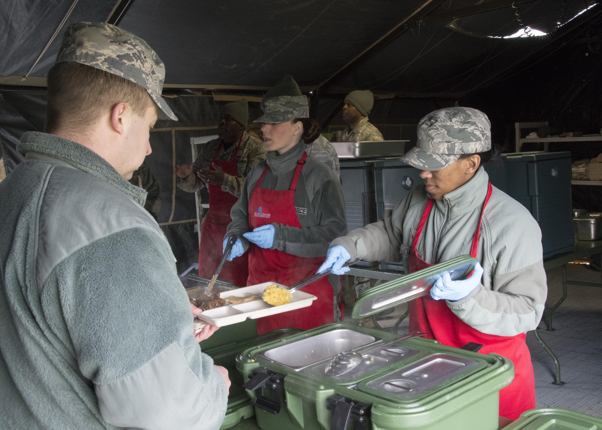 Food service Airmen with the 512th Memorial Affairs Squadron compete for the 2017 John L. Hennessy Award at Dover Air Force Base, Del., March 3, 2017. The Hennessy Award recognizes excellence in foodservices across multiple military branches. (U.S. Air Force photo / Renee M. Jackson)