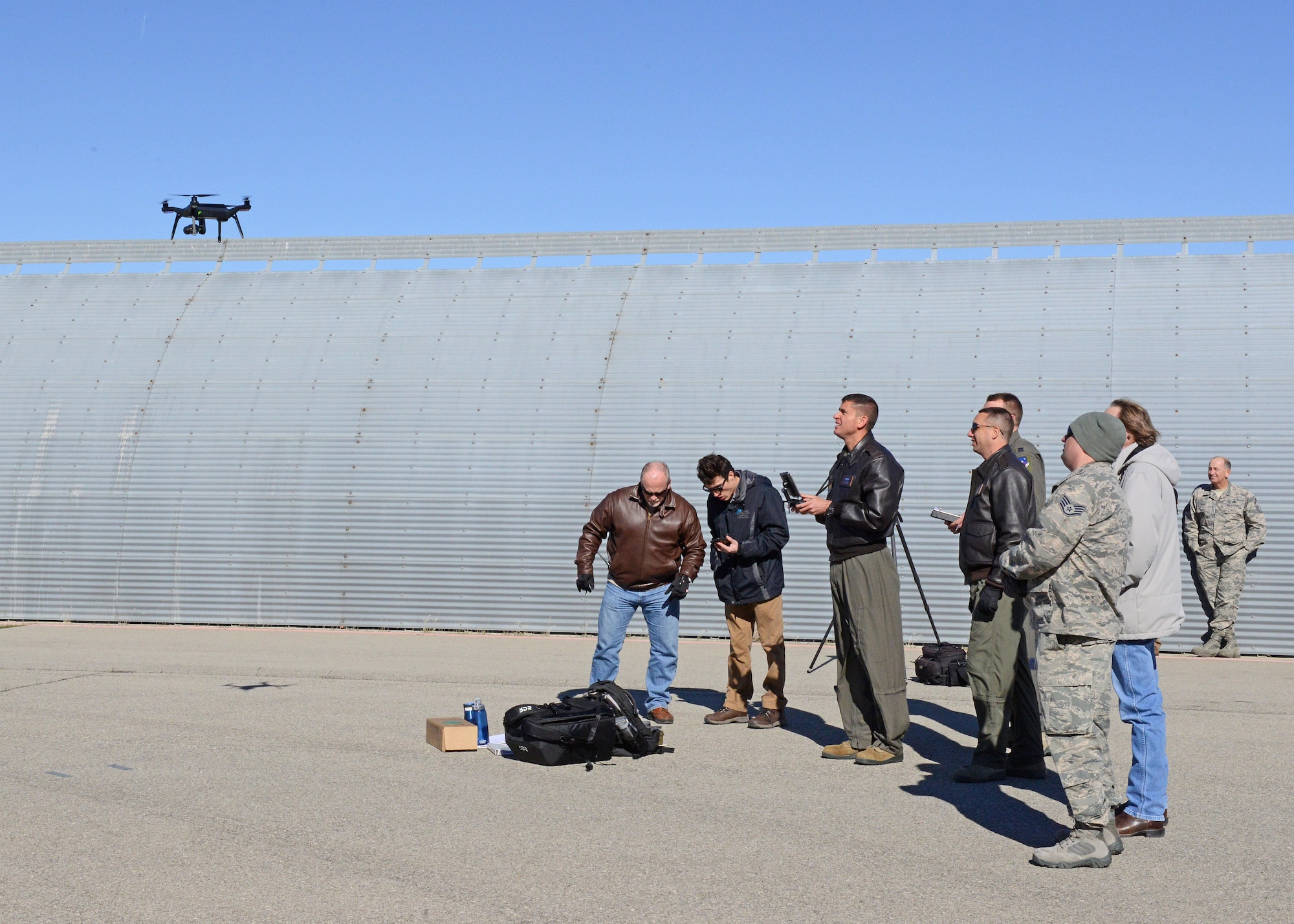 The 412th Test Wing’s Emerging Technologies Combined Test Force conducted three test sorties March 6 using a quadcopter to inspect a C-17 Globemaster III. Maj. Dan Riley, ET CTF director, and Maj. William Niblack, ET CTF operations officer, piloted the small unmanned aerial system. (U.S. Air Force photo by Kenji Thuloweit)