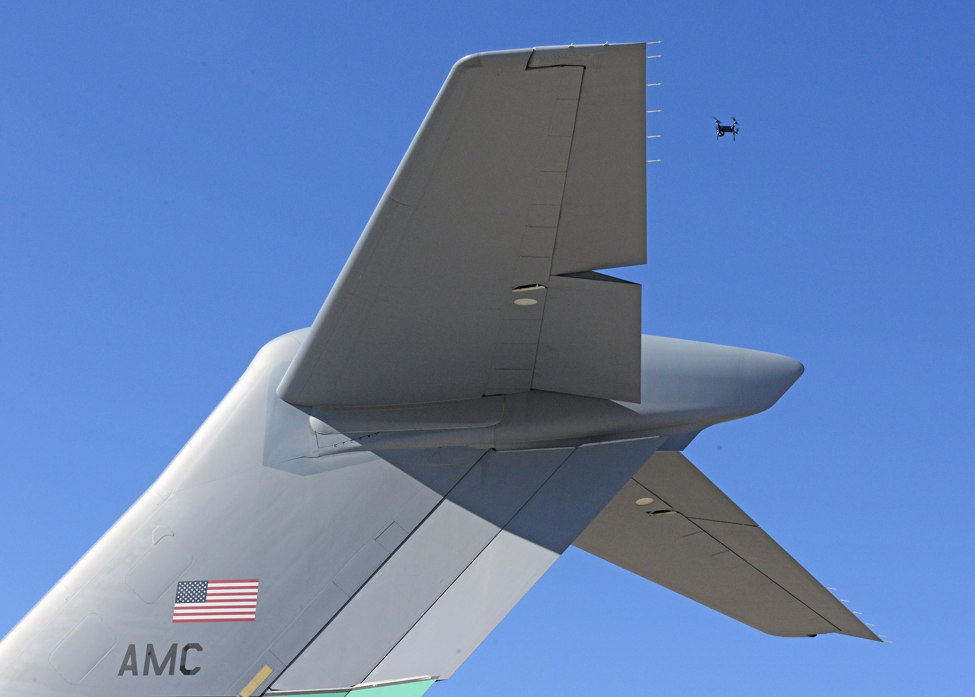 The Emerging Technologies Combined Test Force conducts a test to see if a quadcopter with video camera can be used to conduct exterior maintenance inspections on a C-17 Globemaster III March 6, 2017. (U.S. Air Force photo by Kenji Thuloweit)