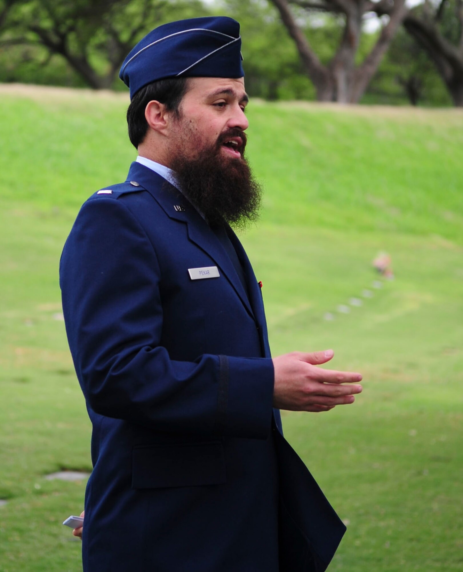 U.S. Air Force 1st Lt. Levy Pekar, Rabbi Chaplain assigned to Nellis Air Force Base, Nev., led the headstone replacement ceremony to honor of Staff Sgt. Jack Weiner, U.S. Army Air Forces, at the National Memorial Cemetery of the Pacific, Honolulu, HI., Feb. 28, 2017. (U.S. Air Force photo by Tech. Sgt. Heather Redman) 