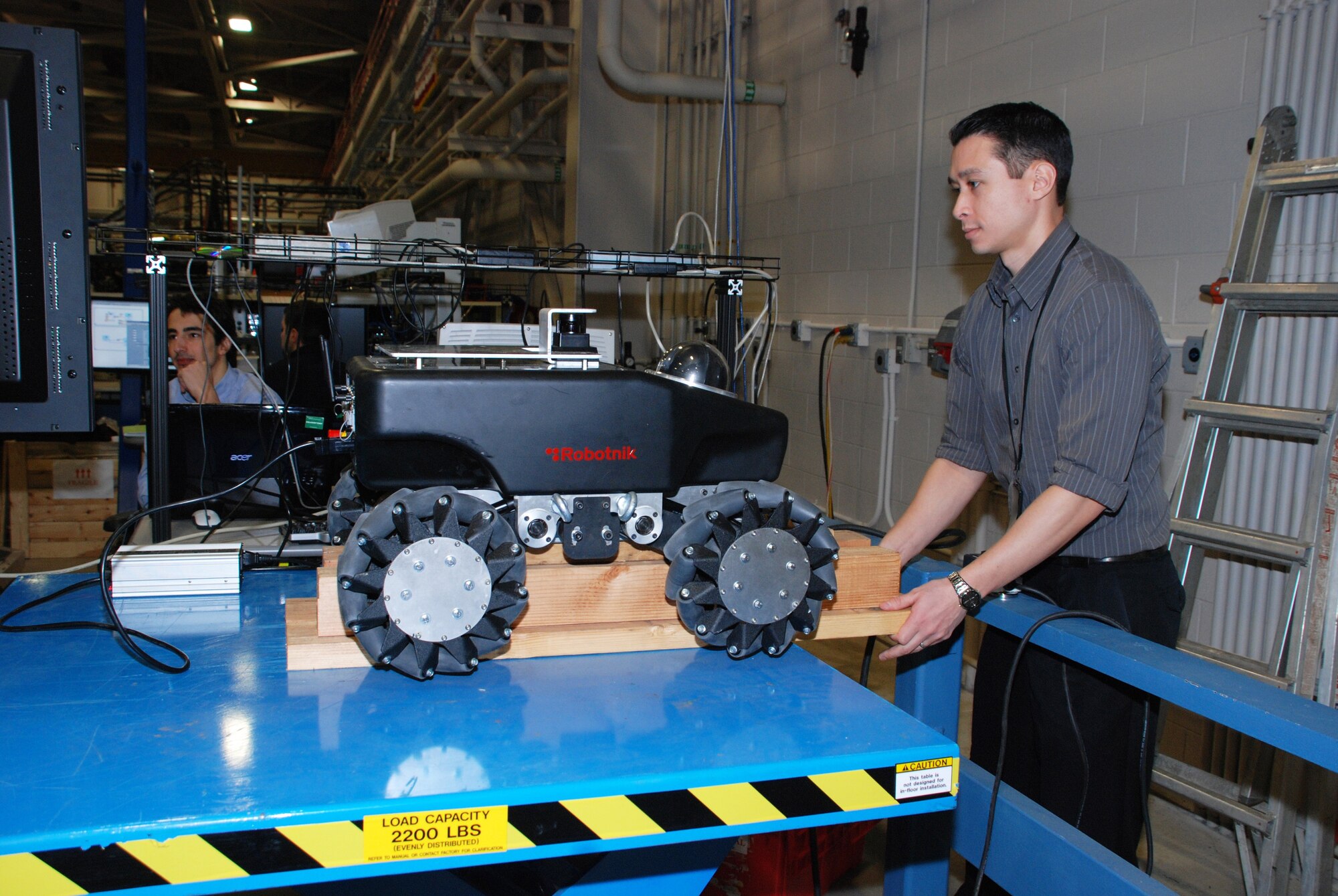 Dr. James Hing, robotics science and technology engineer with the Naval Air Warfare Center Aircraft Division Lakehurst, was awarded Laboratory Scientist of the Quarter for his research in using robotics to optimize workload and increase safety for Sailors on the flight deck. 