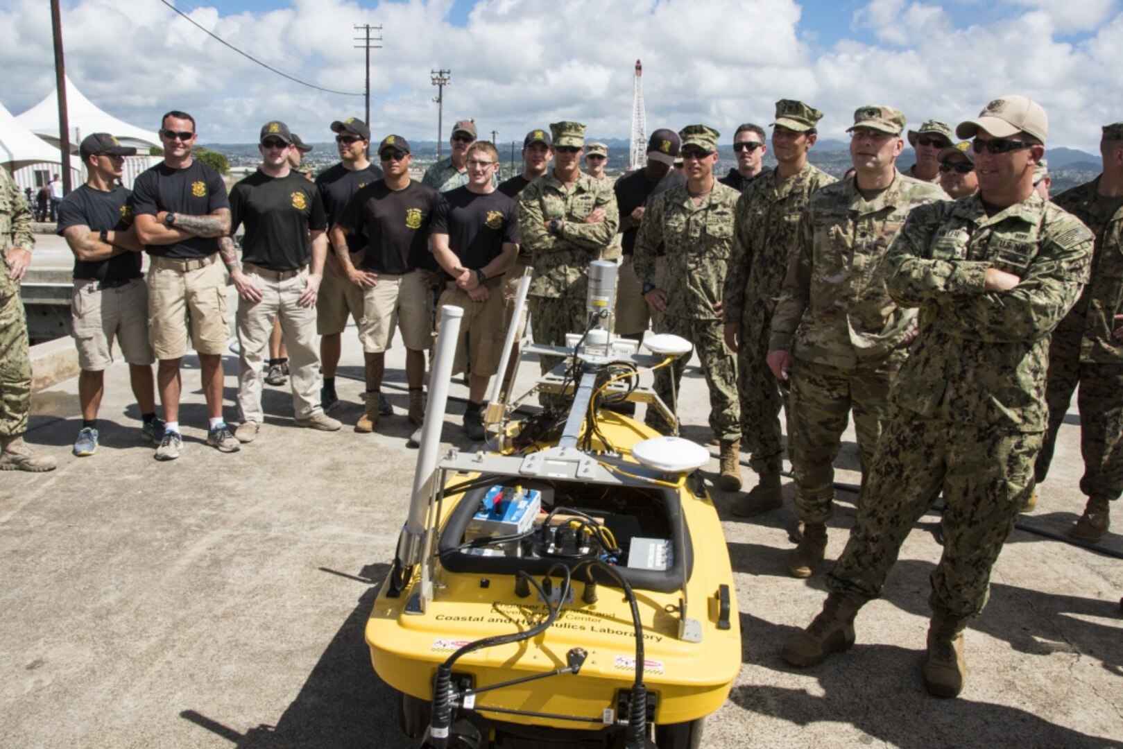 The Army 7th Dive Detachment based in Pearl Harbor, brought a team to pair with four Navy organizations: Underwater Construction Team (UCT) 2 and personnel from Expeditionary Warfare Center, both based Port Hueneme, Calif., along with UCT2 from Little Creek, Va., and a Mobile Dive Salvage Unit from Pearl Harbor for a technology demonstration, March 3, 2017. Port Improvement Via Exigent Repair (PIER) develops ways to rapidly restore functionality to damaged port facilities. 