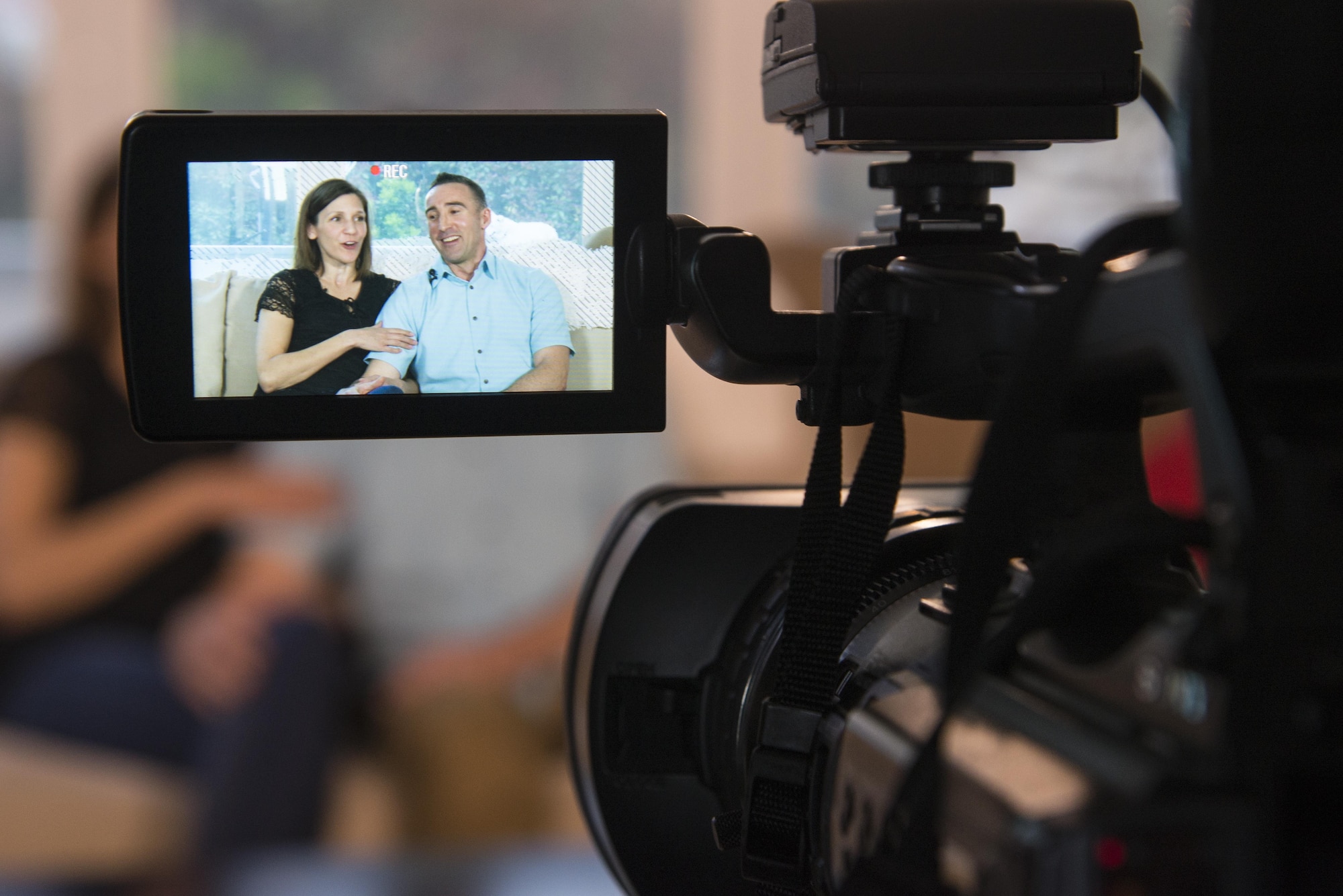 Maj.  Thomas Lessner, 39th Flying Training Squadron instructor pilot, and his wife Kathleen, talk to each other during an interview February 27, 2017.  (U.S. Air Force by Sean M. Worrell)