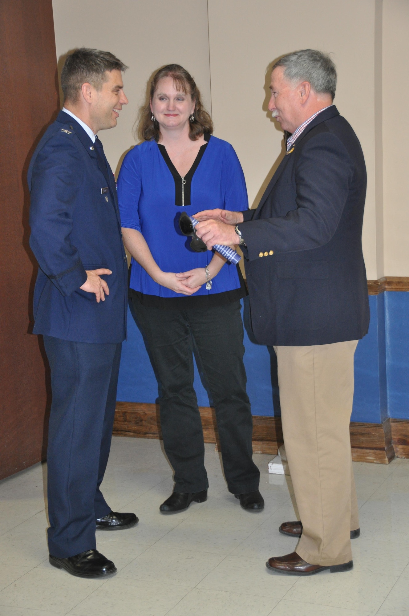 Commander of the 908th Airlift Wing, Col Ken Ostrat and his wife Lora catch up with an old friend, Mike Harper, retired chief loadmaster for the wing, following Ostrat’s Assumption of Command ceremony March 5 at Maxwell Air Force Base. Ostrat and Harper worked together during Ostrat’s previous stint with the wing as the 357th Airlift Squadron’s director of operations from 2008 until 2012. (U.S. Air Force photo by Bradley J. Clark)