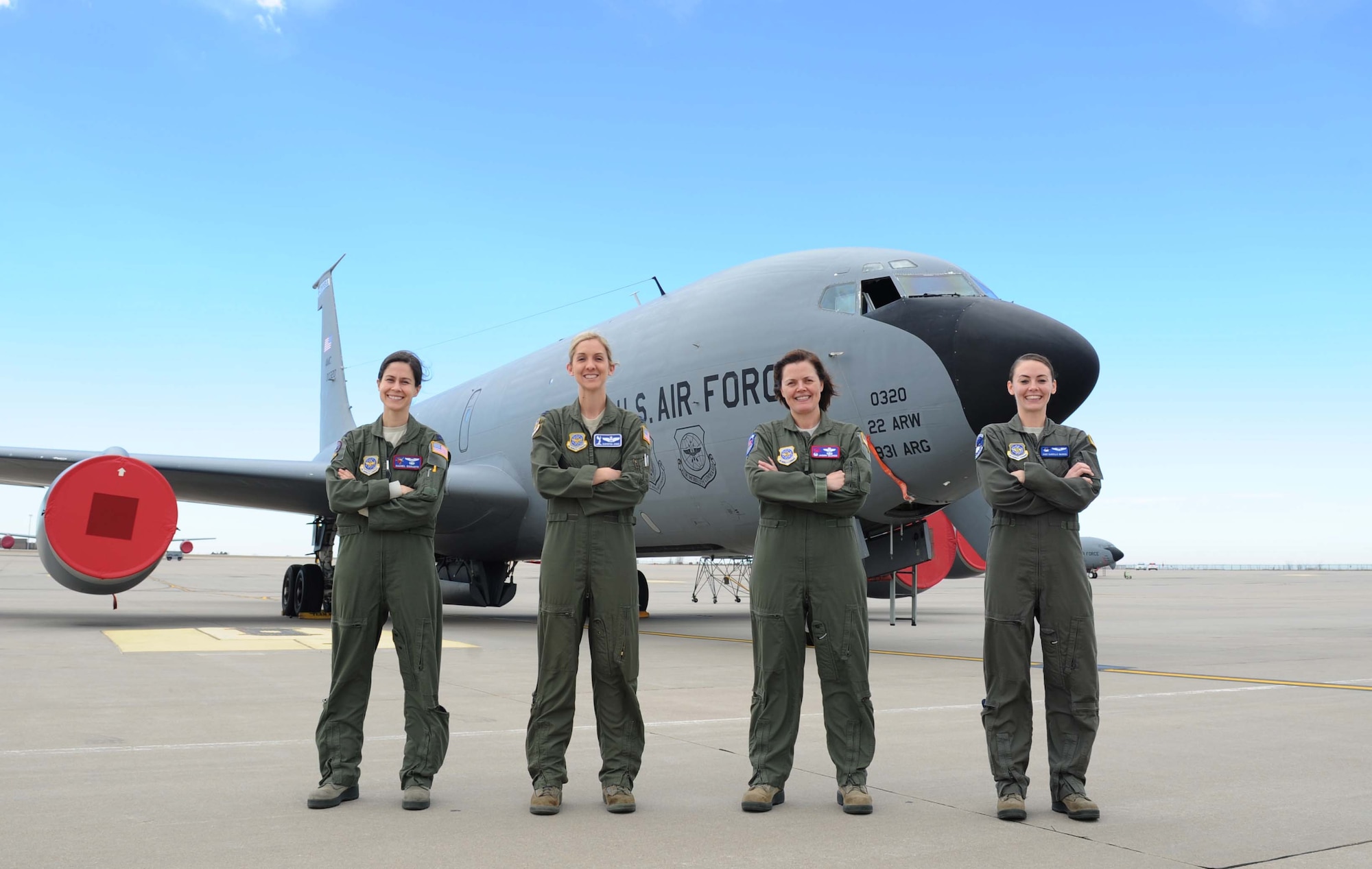 Capt. Rachel Quirarte, 349th Air Refueling Squadron pilot, Maj. Chrystina Jones, 22nd Air Refueling Wing Plans and Programs deputy chief, Lt. Col. Jasmin Silence, 350th Air Refueling Squadron commander, and Staff Sgt. Danielle Warren, boom operator, stand in front of a KC-135 Stratotanker February 23, 2017 at McConnell Air Force Base, Kan.They showcase the career diversity of Team McConnell members. . (U.S. Air Force photo/Senior Airman Tara Fadenrecht)
