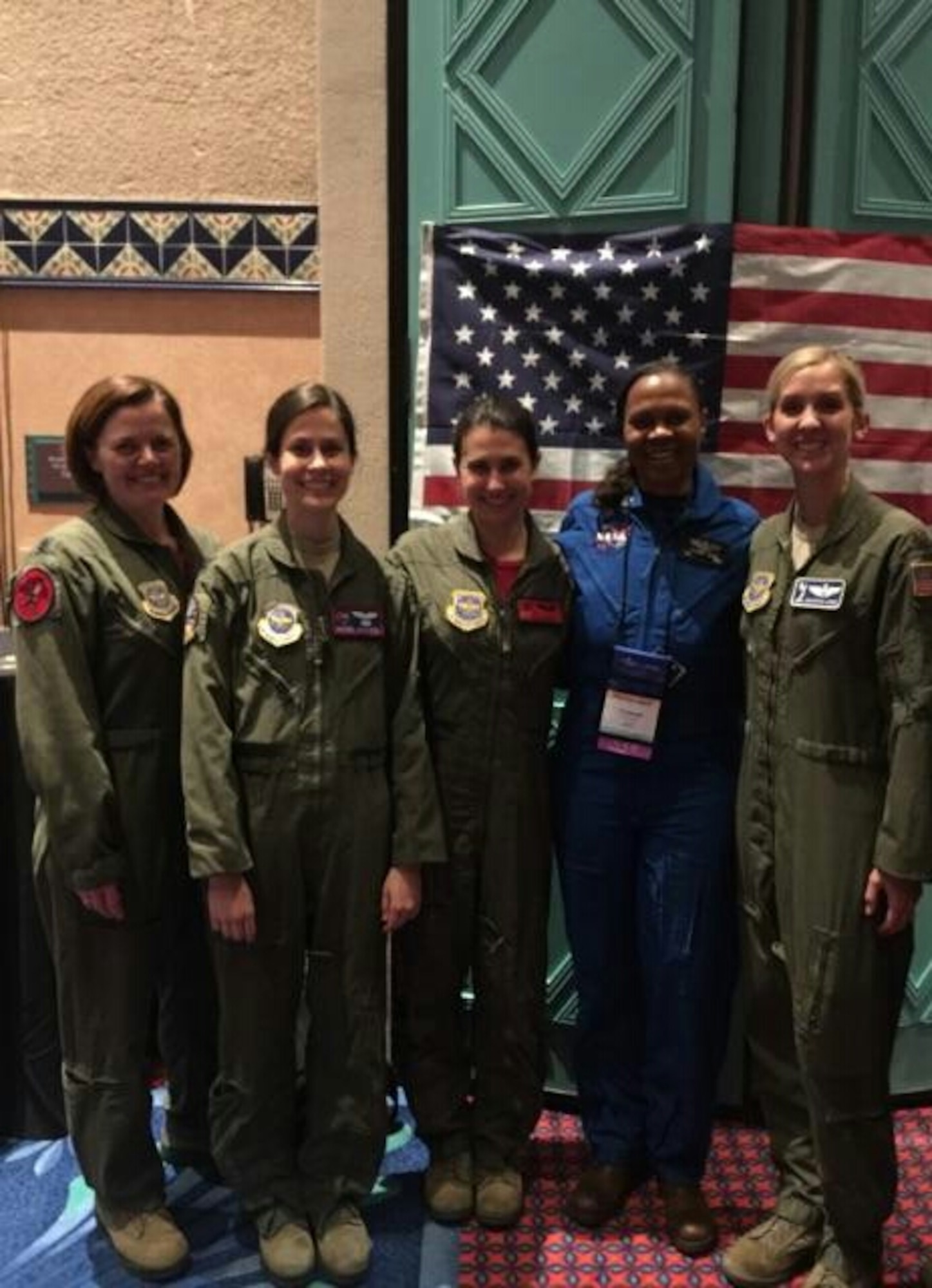 Members of Team McConnell pose for a photo with retired Col. Yvonne Cagle, astronaut, March 3, 2017 in Orlando, Fla. Cagle is currently working for NASA as a flight surgeon. (U.S. Air Force photo/2nd Lt. Carla Stefaniak)
