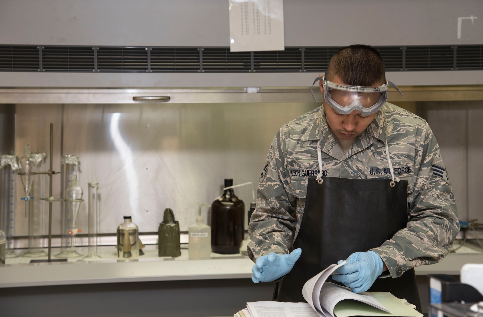 U.S. Air Force Senior Airman Ken Leon Guerrero, a fuels laboratory technician with the 35th Logistics Readiness Squadron, looks at previous fuel records at Misawa Air Base, Japan, March 6, 2017. Fuels technicians perform checks twice a day, ensuring the quality of the fuel is not contaminated. Without fuel, jets could not assist in enhancing our presence in the region by strategically distributing our posture over a wider geographic range. (U.S. Air Force photo by Airman 1st Class Sadie Colbert)