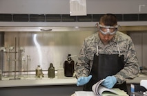 U.S. Air Force Senior Airman Ken Leon Guerrero, a fuels laboratory technician with the 35th Logistics Readiness Squadron, looks at previous fuel records at Misawa Air Base, Japan, March 6, 2017. Fuels technicians perform checks twice a day, ensuring the quality of the fuel is not contaminated. Without fuel, jets could not assist in enhancing our presence in the region by strategically distributing our posture over a wider geographic range. (U.S. Air Force photo by Airman 1st Class Sadie Colbert)