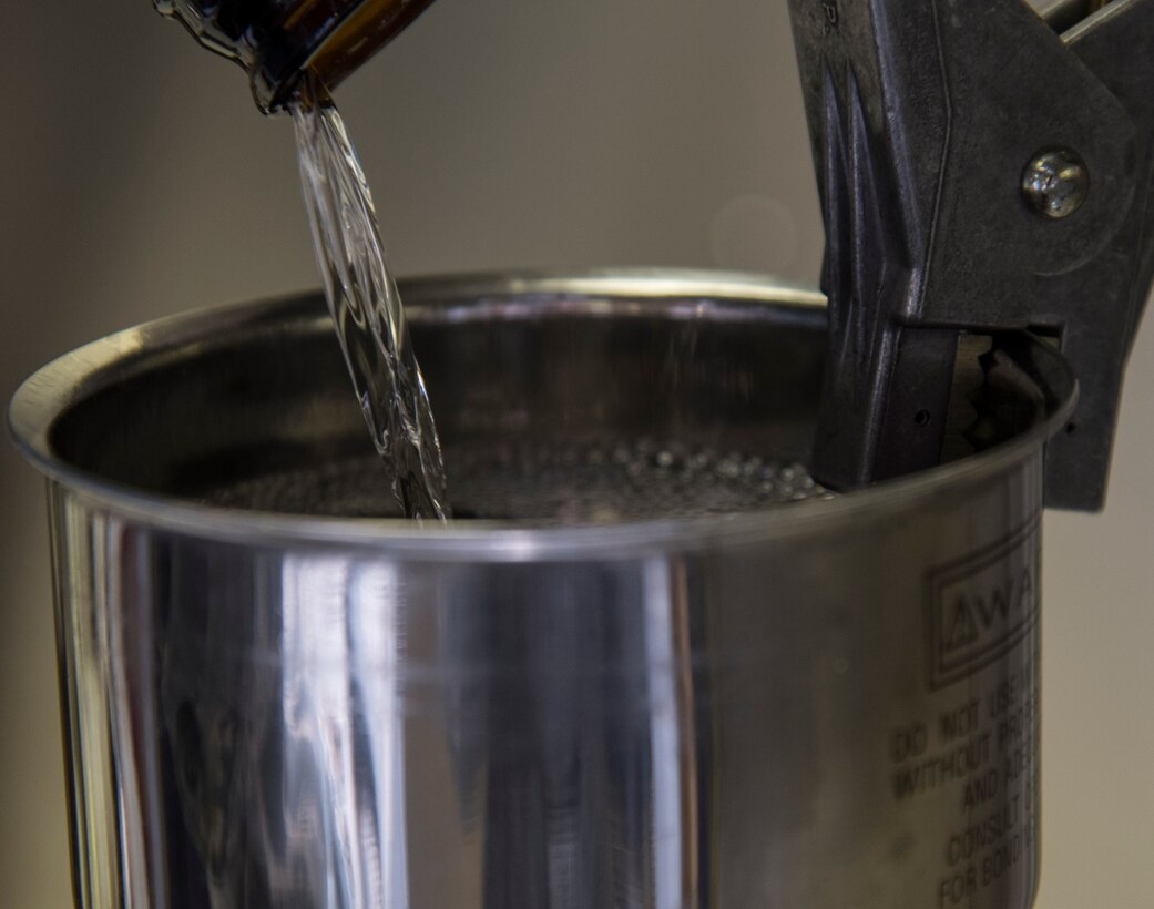 Jet Propellant 8 fuel goes through a micronic filter at Misawa Air Base, Japan, March 6, 2017. As the fuel goes through the filter, any particulate matter that is unseen by the human eye will be caught and will be displayed after removing the filter and baking in an oven. For each batch of fuel a gallon sample is processed to search for contaminants. (U.S. Air Force photo by Airman 1st Class Sadie Colbert)