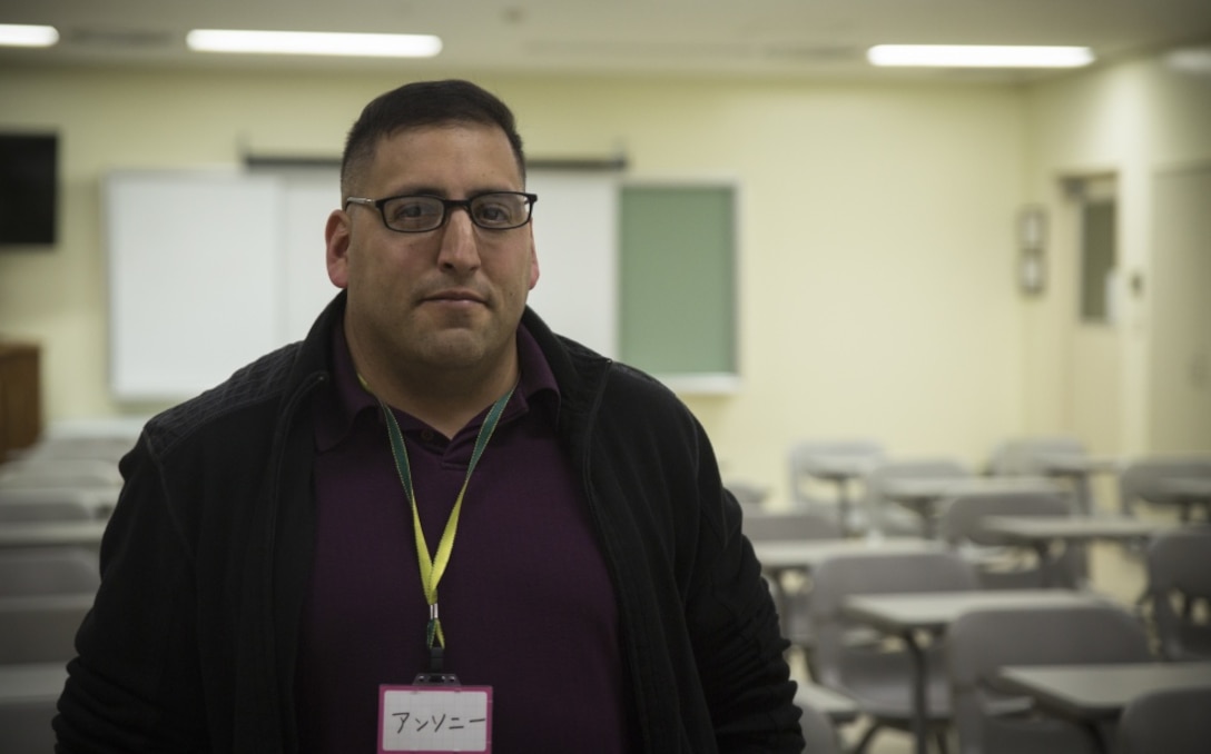 Master Sgt. Anthony Camina, a native of San Antonio, Texas, has been in the Marine Corps for 24 years. He currently teaches the Kin-Hansen Friendship English Class to locals in Kin Town, Okinawa, Japan. Camina and his wife, Michelle, have been giving back to the local community since 2013. (U.S. Marine Corps photo by Lance Cpl. Andy Martinez) 