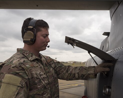 Staff Sgt. Justin O’Brien, 7th Special Operations Squadron special mission aviator, inspects the fuel port of CV-22 Osprey Mar. 7, 2017, on RAF Mildenhall, England. CV-22 SMAs perform a diverse set of duties which vary depending on which of the two crew positions they are assigned for on a mission. (U.S. Air Force photo/Capt Chris Sullivan)